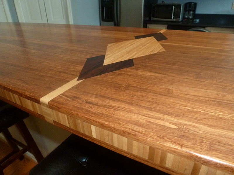 1.5" thick Bamboo countertop with diamond inlay, 1/8" roundover edge treatment and permanent finish