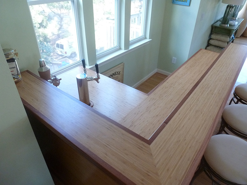 1.5" thick Bamboo countertops with Sapele Mahogany edging, 1/8" roundover edge treatment and permanent finish 