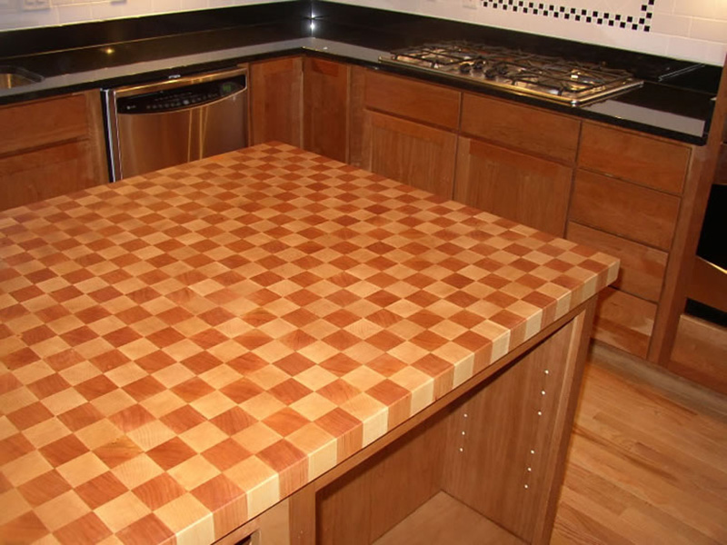 2.25" thick Hard Maple and Cherry end grain (checkerboard) countertop with 1/4" roundover edge treatment and food safe mineral oil