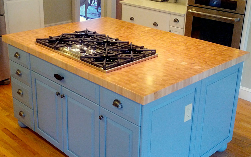 2.5" thick Hard Maple end grain countertop with 1/4" roundover edge treatment and permanent finish