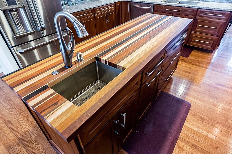 1.5" thick Multi-species edge grain countertop with 1/4" roundover edge treatment and food safe mineral oil
