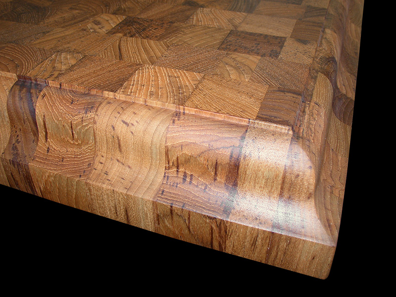 3" thick Teak end grain countertop with large fomat classical edge treatment and food safe mineral oil.