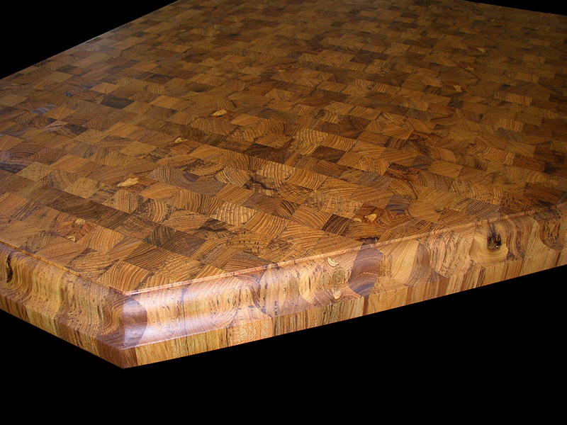 3" thick Teak end grain countertop with large fomat classical edge treatment and food safe mineral oil.