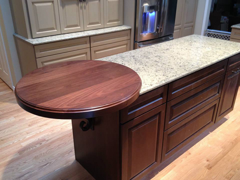 2.5" thick Walnut flat grain countertop with small Roman ogee edge treatment and permanent finish over custom stain.